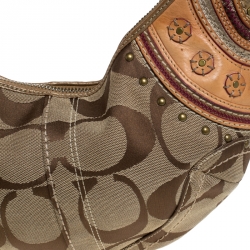 Pre Owned Coach Beige/Tan Signature Canvas and Leather Studded Mia Soho Hobo