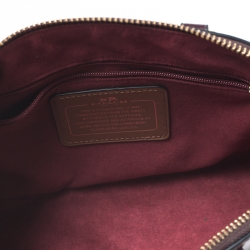 مملوكة مسبقًا حقيبة كوتش سيرا جلد عنابي لامع