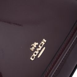 مملوكة مسبقًا حقيبة كوتش سيرا جلد عنابي لامع