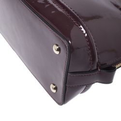 مملوكة مسبقًا حقيبة كوتش سيرا جلد عنابي لامع