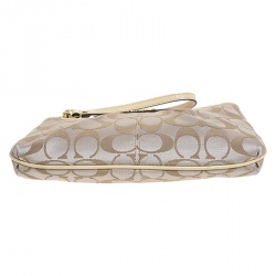 Pre Owned Coach Beige Signature Canvas and Leather Wristlet Clutch