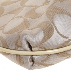 Pre Owned Coach Beige Signature Canvas and Leather Wristlet Clutch