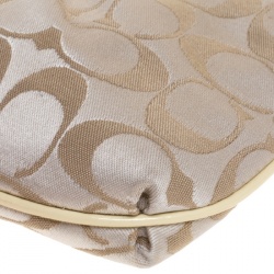 Pre Owned Coach Beige Signature Canvas and Leather Wristlet Clutch