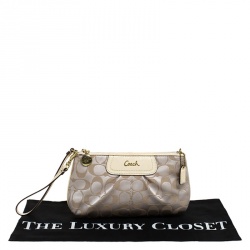 Pre Owned Coach Beige Signature Canvas and Leather Wristlet Clutch