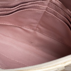 Pre Owned Coach Beige Signature Canvas and Leather Wristlet Clutch