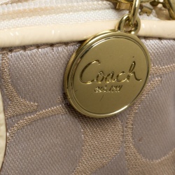 Pre Owned Coach Beige Signature Canvas and Leather Wristlet Clutch