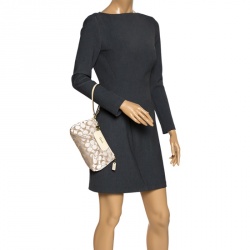 Pre Owned Coach Beige Signature Canvas and Leather Wristlet Clutch