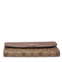 Pre Owned Coach Brown Signature PVC and Leather Saddle Flap Continental Wallet