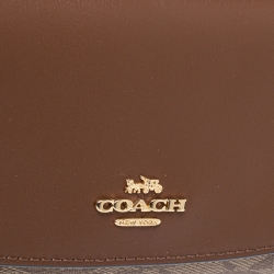 Pre Owned Coach Brown Signature PVC and Leather Saddle Flap Continental Wallet
