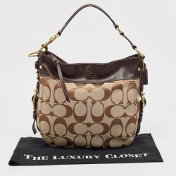 Pre Owned Coach Brown/Beige Signature Canvas and Leather Buckle Hobo