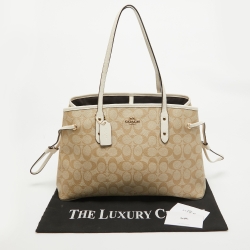 Pre Owned Coach Beige/White Signature Coated Canvas and Leather Drawstring Carryall Bag
