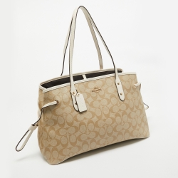 Pre Owned Coach Beige/White Signature Coated Canvas and Leather Drawstring Carryall Bag