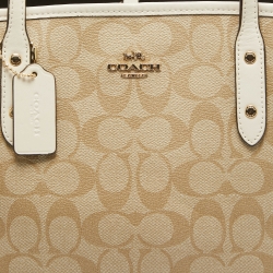 Pre Owned Coach Beige/White Signature Coated Canvas and Leather Drawstring Carryall Bag
