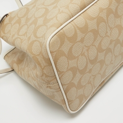 Pre Owned Coach Beige/White Signature Coated Canvas and Leather Drawstring Carryall Bag