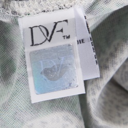 Pre Owned Diane Von Furstenberg Green Animal Figure Printed Jersey Silk Cybil Wrap Dress S