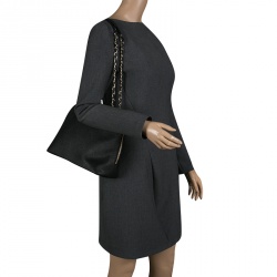 Pre Owned حقيبة دي كي أن واي مستديرة جلد سافيانو سوداء