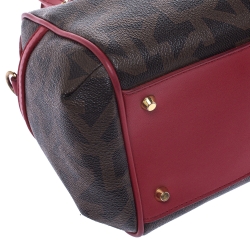 Pre Owned Dkny Brown/Red Monogram Coated Canvas and Leather Boston Bag