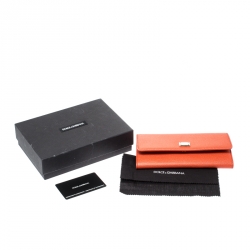 Pre Owned Dolce and Gabbana Orange Leather Dauphine Continental Wallet