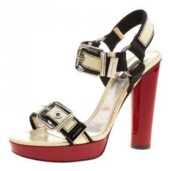 Pre Owned صندل دولتشي أند غابانا جلد كريمي لامع نعل سميك مقاس 40.5