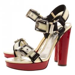 Pre Owned صندل دولتشي أند غابانا جلد كريمي لامع نعل سميك مقاس 40.5