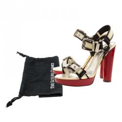 Pre Owned صندل دولتشي أند غابانا جلد كريمي لامع نعل سميك مقاس 40.5