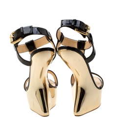 Pre Owned صندل جوسيبي زانوتي كعب روكي سير T كعب رفيع جلد لامع ذهبي/ أسود مقاس 37