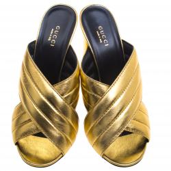 مملوكة مسبقًا Gucci Gold Metallic Leather Sylvia Crossover Mules Size 39.5