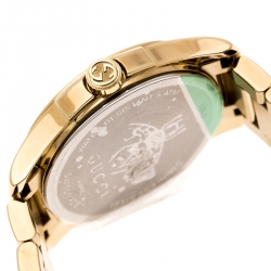 Pre Owned Gucci Cream Gold Plated Stainless Steel G-Timeless 126.5 Women's Wristwatch 27 mm