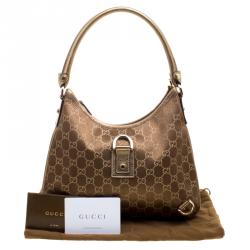 مملوكة مسبقًا حقيبة غوتشي آبي دي رينغ قماش GG بيج/ذهبي متوسطة 