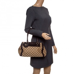 مملوكة مسبقًا حقيبة يد غوتشي تروفي صغيرة جلد وكانفاس GG بنية/ بيج