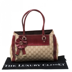 مملوكة مسبقًا حقيبة يد غوتشي تروفي صغيرة جلد وكانفاس GG حمراء/ بيج