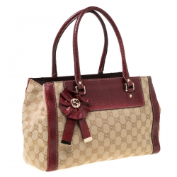 مملوكة مسبقًا حقيبة يد غوتشي تروفي صغيرة جلد وكانفاس GG حمراء/ بيج
