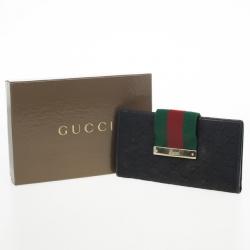 Gucci Black Continental Wallet With Engraved Gucci Script Logo