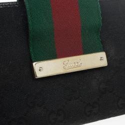 Gucci Black Continental Wallet With Engraved Gucci Script Logo