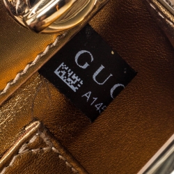 Pre Owned Gucci Gold Leather G Interlocking Frame Clutch