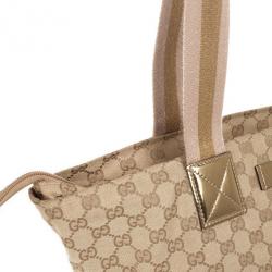 Pre Owned حقيبة غوتشي ميتاليك وبيج بالشعار