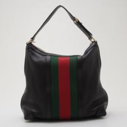 black gucci bag with red and green strap