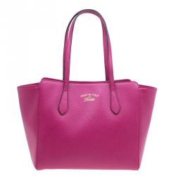 مملوكة مسبقًا حقيبة غوتشي سوينغ جلد فوشيا