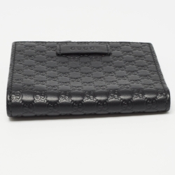 مملوكة مسبقًا Gucci Black Microguccissima Leather Compact Wallet