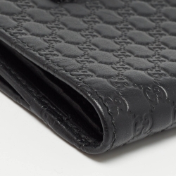 مملوكة مسبقًا Gucci Black Microguccissima Leather Compact Wallet