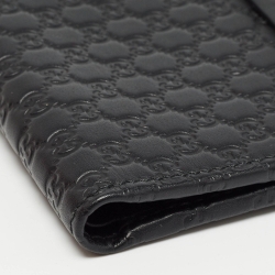 مملوكة مسبقًا Gucci Black Microguccissima Leather Compact Wallet