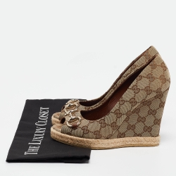 Pre Owned Gucci Beige/Brown GG Canvas Horsebit Peep Toe Wedge Espadrille Pumps Size 36.5