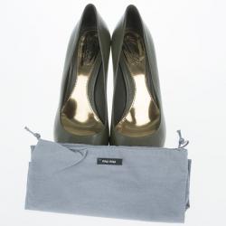 مملوكة مسبقًا Gucci Green Leather 'Sofia' Peep Toe Platform Pumps Size 38.5