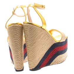 Pre Owned صندل غوتشي سير كاحل كعب روكي إسبادريل رافيا وجلد ذهبي ميتالك مقاس 37