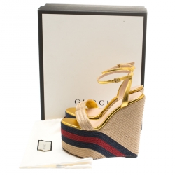 Pre Owned صندل غوتشي سير كاحل كعب روكي إسبادريل رافيا وجلد ذهبي ميتالك مقاس 37