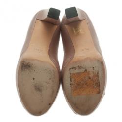 مملوكة مسبقًا Gucci Pink Metallic Leather Horsebit Peep Toe Platform Pumps Size 39.5