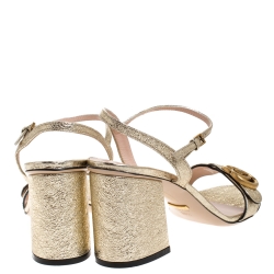 مملوكة مسبقًا Gucci Gold Textured Leather GG Marmont Ankle Strap Sandals Size 38.5