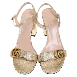 مملوكة مسبقًا Gucci Gold Textured Leather GG Marmont Ankle Strap Sandals Size 38.5