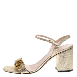 مملوكة مسبقًا Gucci Gold Textured Leather GG Marmont Ankle Strap Sandals Size 38.5