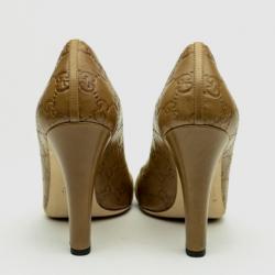 Pre Owned Gucci GG Logo Stamped Guccissima Caramel Leather Open Toe Pumps Size 38.5